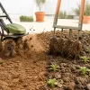 Motobineuse ou grelinette pour 50 m² de potager : le choix qui dépend de votre dos