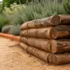 Réussir un muret en rondins de bois : guide complet de mise en œuvre au jardin